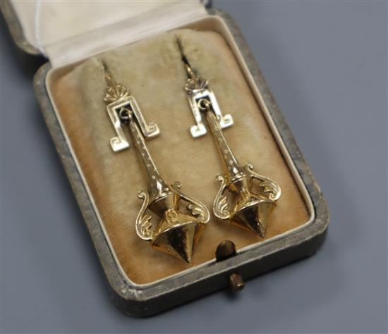 A near pair of ornate 19th century yellow metal drop earrings, 48mm & 52mm.